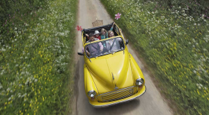 The Extra Mile family driving country lane